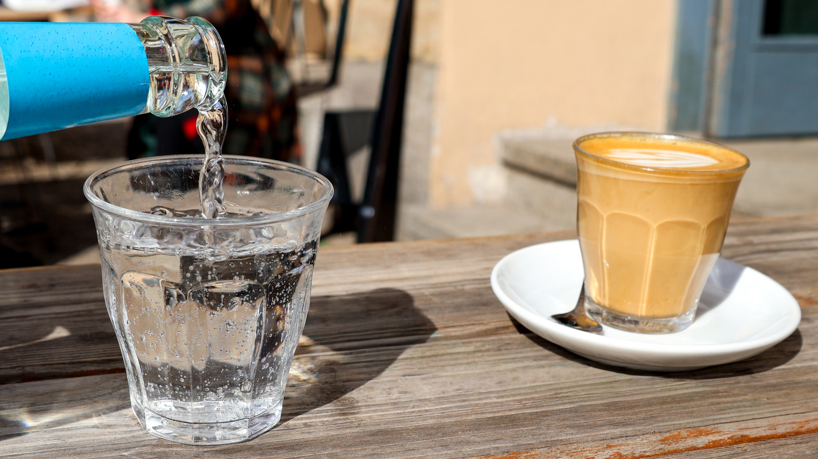 Why Coffee In Italy Often Comes With A Shot Of Seltzer Water On The Side