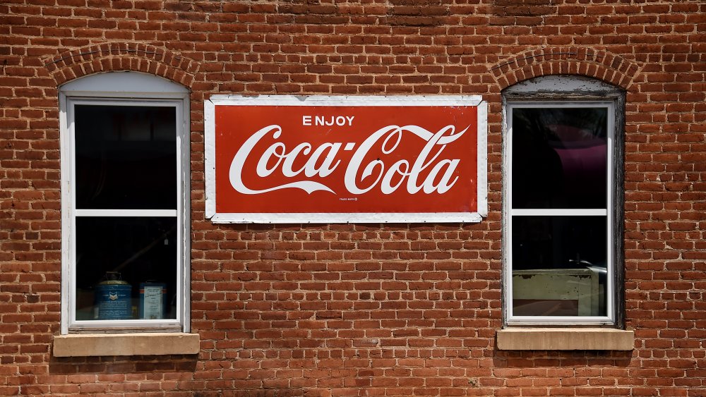 Coca-Cola sign on brick building