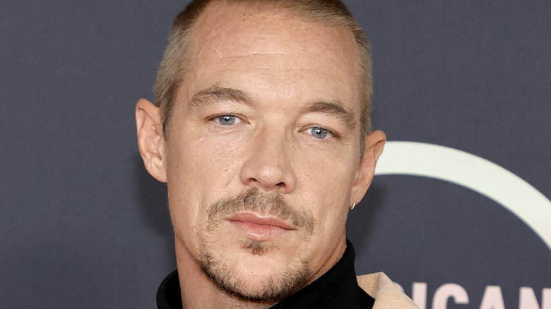 Diplo wearring earring