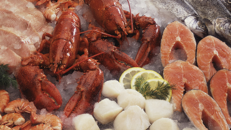 various types of seafood on ice