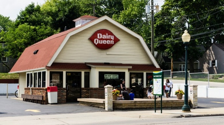 A nostalgic look at an earlier storefront design for Dairy Queen that had a barn shape and country style.