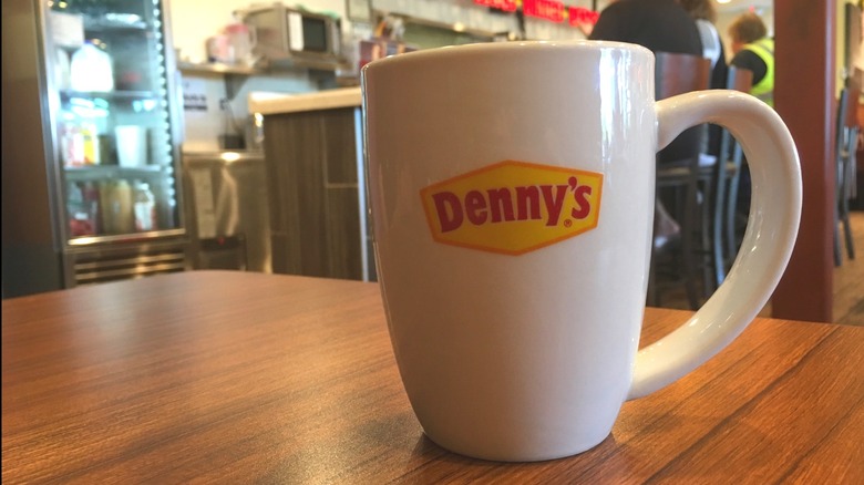 A coffee cup at a Denny's outlet