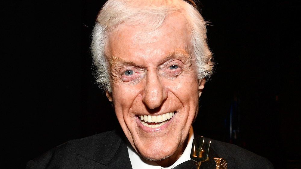 Dick Van Dyke holding trophy