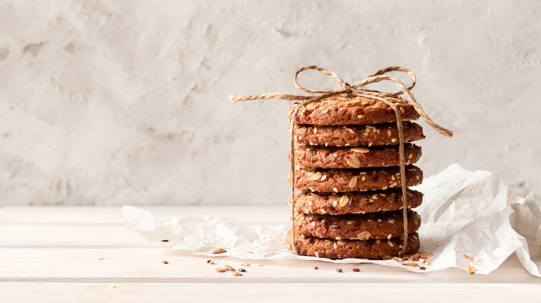 Oatmeal cookies with seeds on a white paper