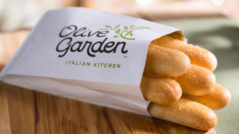 Olive Garden breadsticks on wooden table