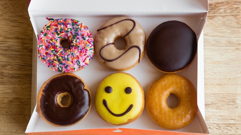 assorted frosted donuts in box