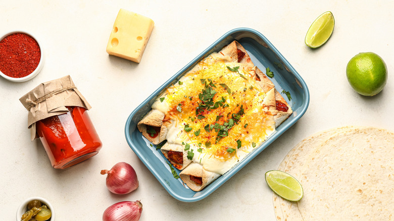 enchiladas surrounded by ingredients