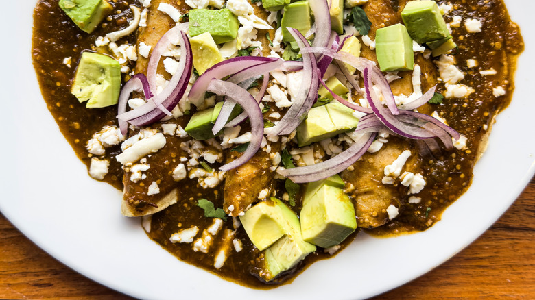 enchiladas in a mole sauce