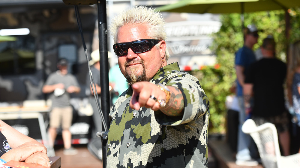 Chef Guy Fieri in a camo shirt