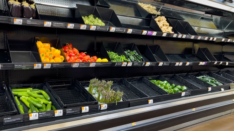 Empty produce bins at the supermarket