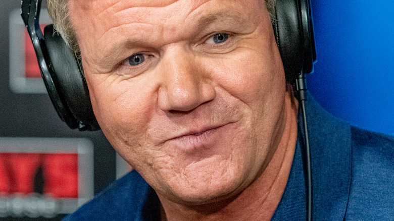 Gordon Ramsay wearing headphones during radio interview