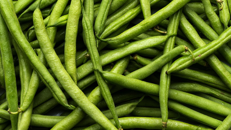 Green beans are shown close up.