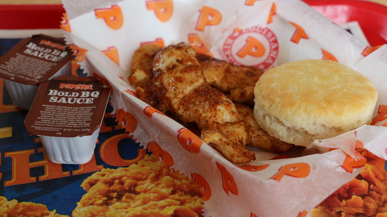 Popeyes chicken tenders and biscuit