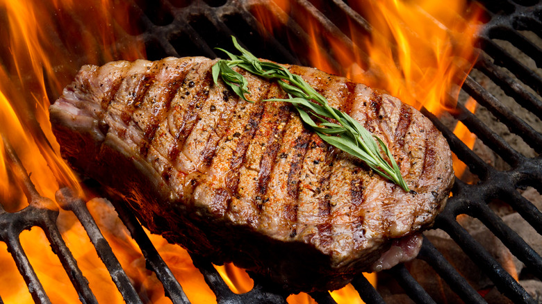 Steak over flames