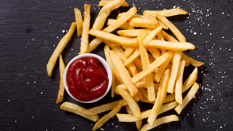 French fries with salt and ketchup