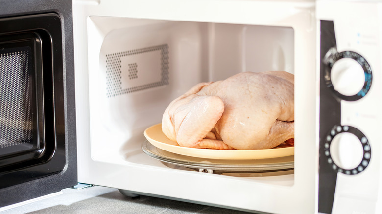 Food thaws in a microwave