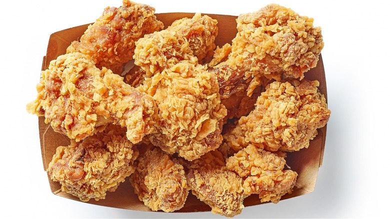 Container of fried chicken