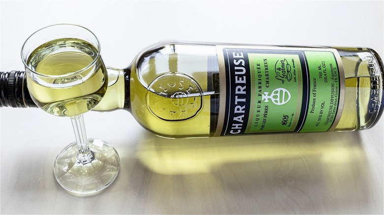 Green Chartreuse bottle and glass