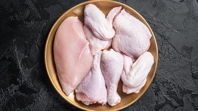 various cuts of raw chicken