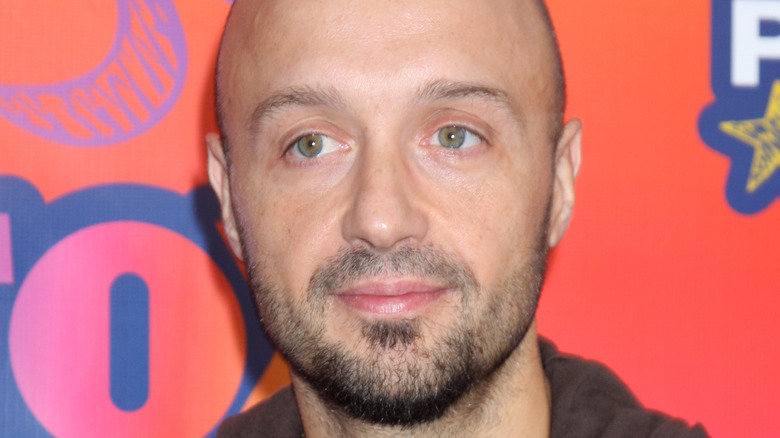 Joe Bastianich faintly smiling