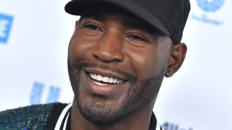 Karamo Brown smiling