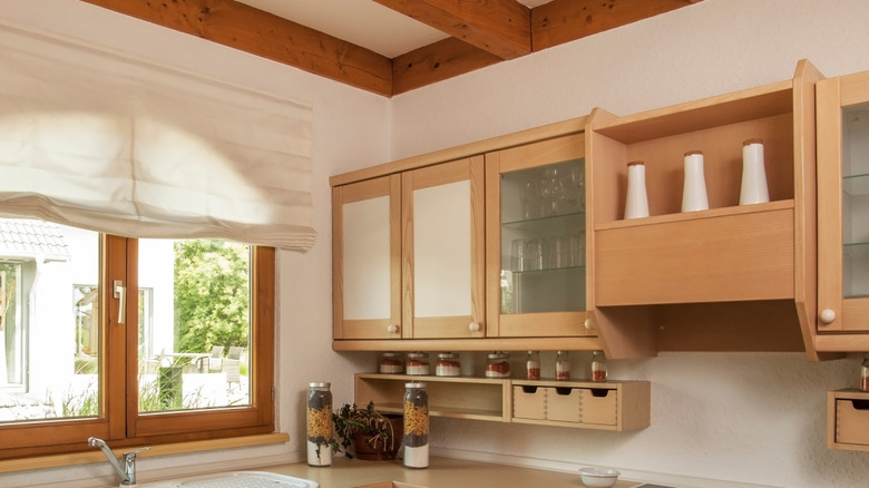 Kitchen cabinets with space between cabinets and cieling