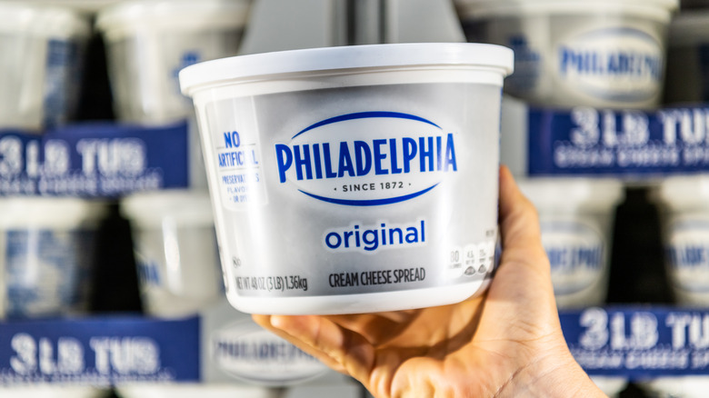 A white tub of Philadelphia cream cheese