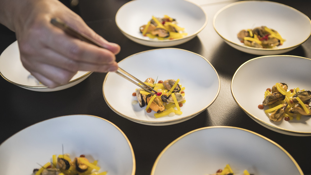 Dressing plates at a Michelin restaurant