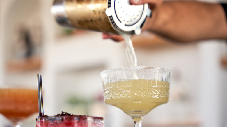 bartender pouring margarita