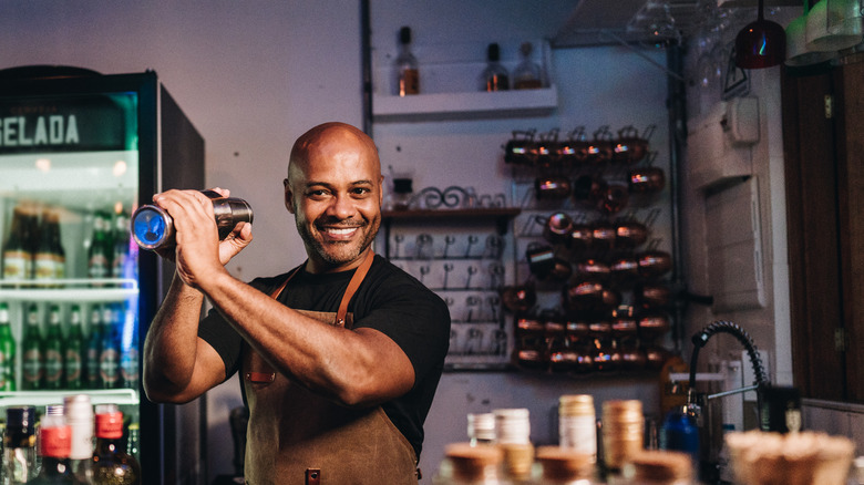 bartender shaking cocktail