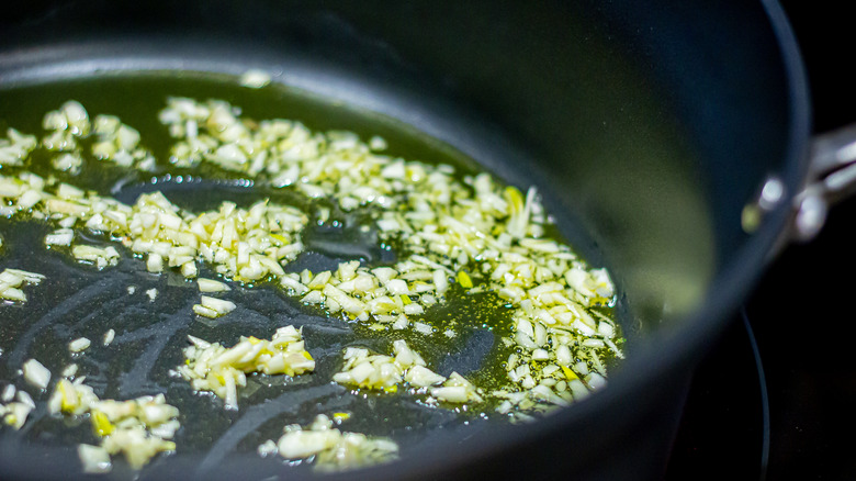 Garlic cooking in pan