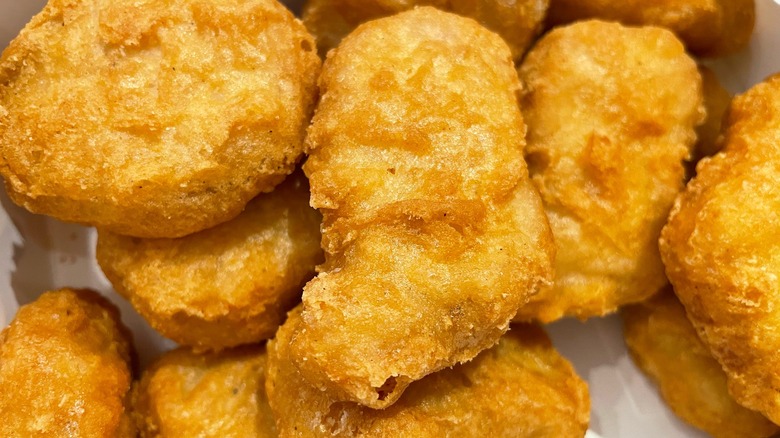 A close-up shot of Chicken McNuggets from McDonald's.