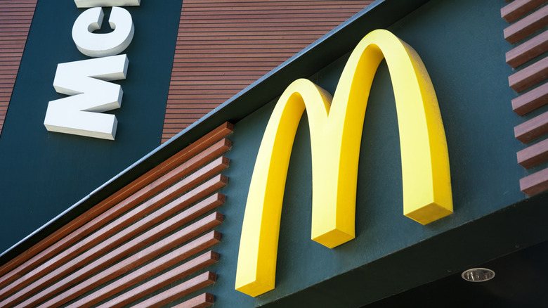 McDonald's golden arch sign on building