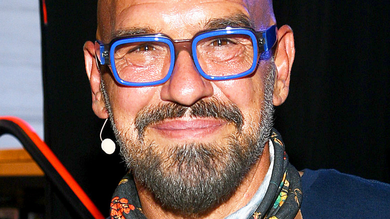 Michael Symon in blue glasses