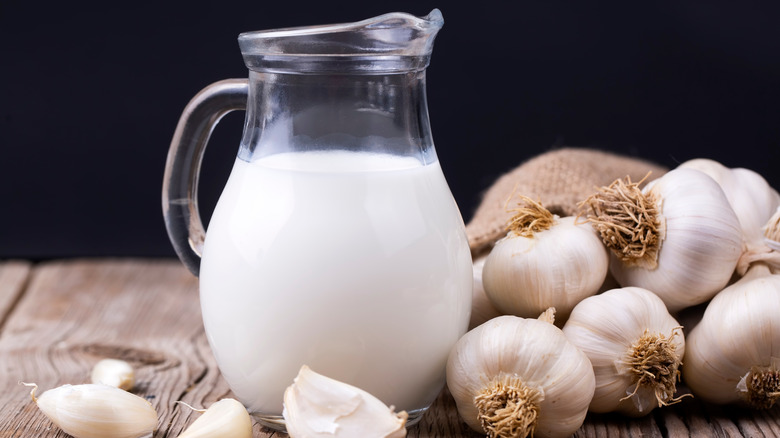 Pitcher of milk with garlic