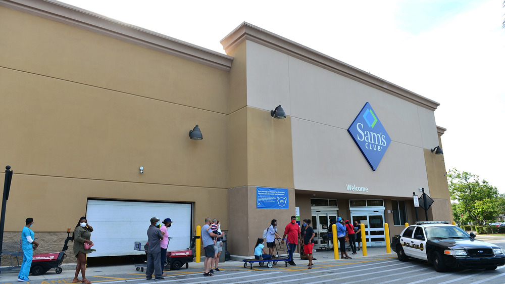Sam's Club with line of shoppers outside