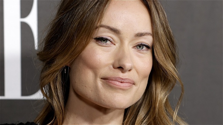 Olivia Wilde smirking