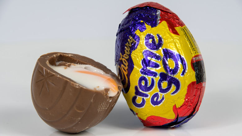 Cadbury Egg in foil on a white background