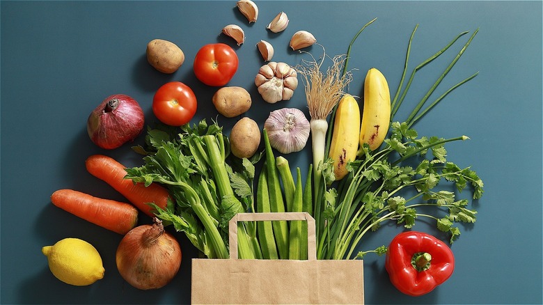 Fruits and vegetables coming out of brown paper bag