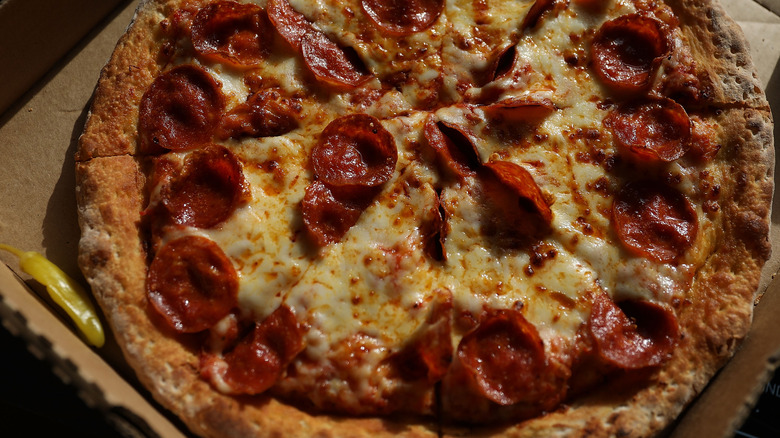 Boxed pepperoni pizza