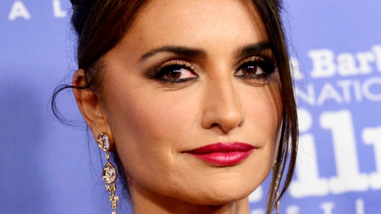 Penélope Cruz smirking