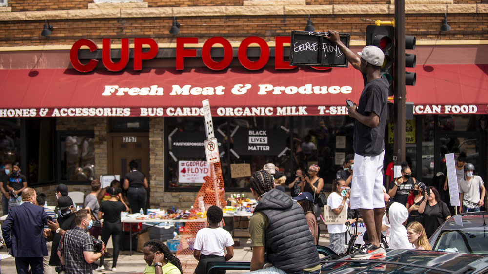 Protestors gathered outside Cup Foods
