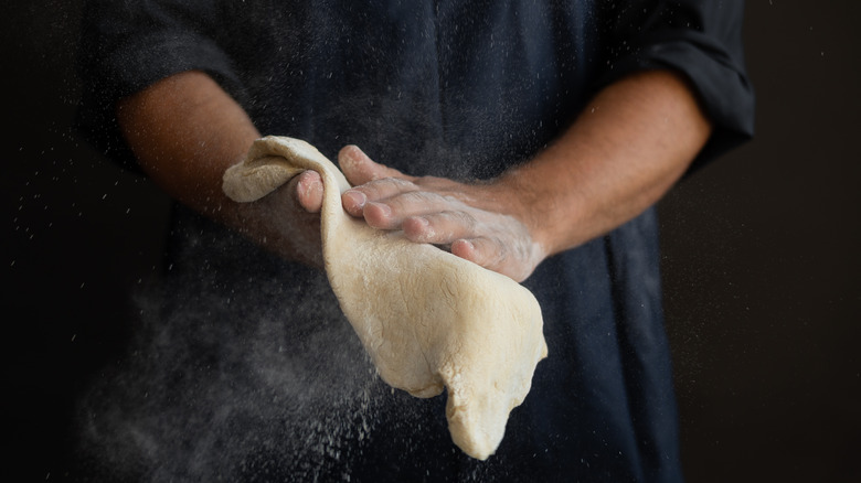 hands making dough