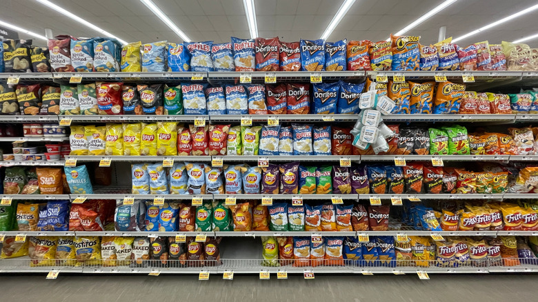 The potato chip section at a grocery store.