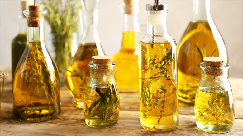 glass bottles of infused olive oil