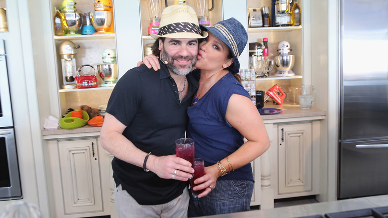 Rachael Ray kisses John Cusimano in hats