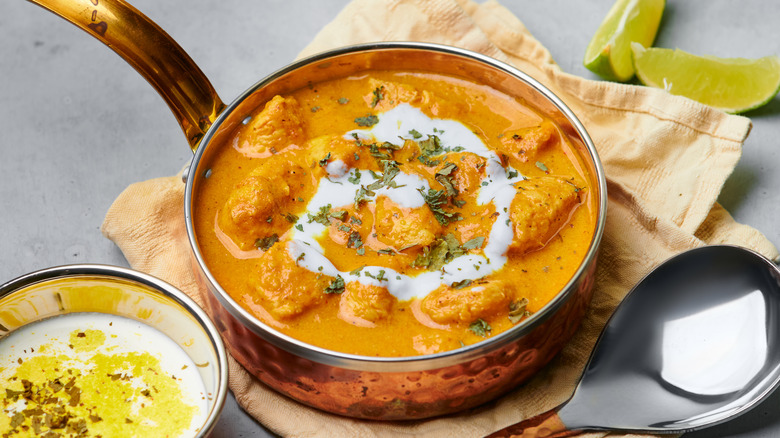 Butter chicken copper pot lime