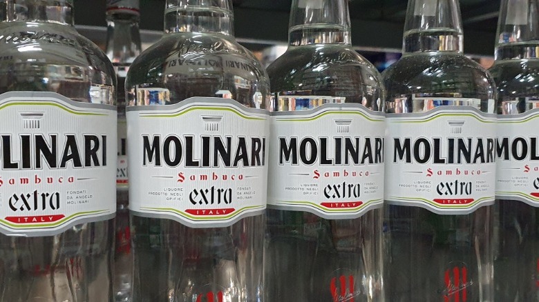 Bottles of Molinari sambuca extra on a shelf