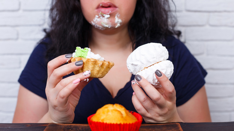 Person eating sloppily