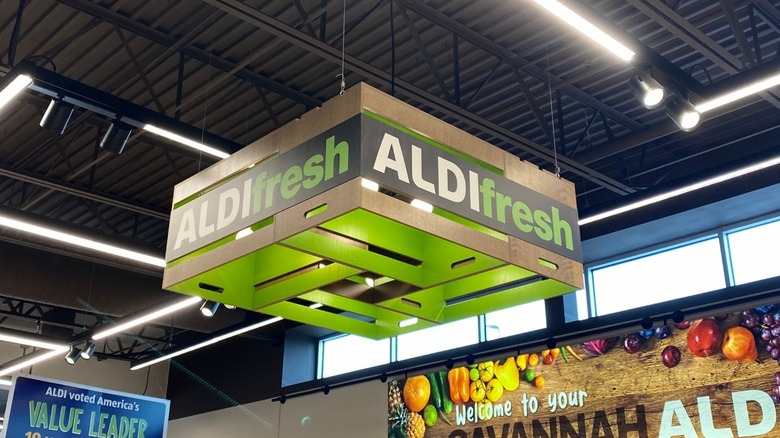 Aldi poster hanging in store